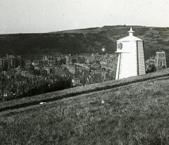 H001051 West Hill lighthouse, Hastings, showing St. Clements Church and Hastings old town - Flickr - East Sussex Libraries Historical Photos.jpg